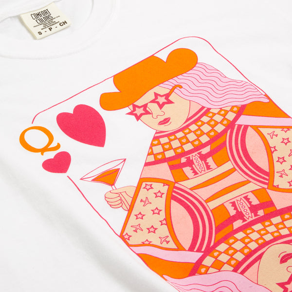 Detailed close up of the design which features a Queen of Hearts playing card design in shades of pink and orange.  The queen is wearing star shaped sunglasses, holding a martini glass, and features a pattern of design elements like miniature airplanes, stars, and a checkerboard.  Design is a full chest design.  